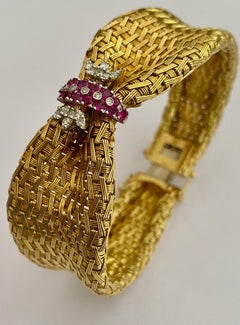 18 Karat Yellow Gold Bracelet Set with 16 Burma Rubies and 20 Diamonds, 1950