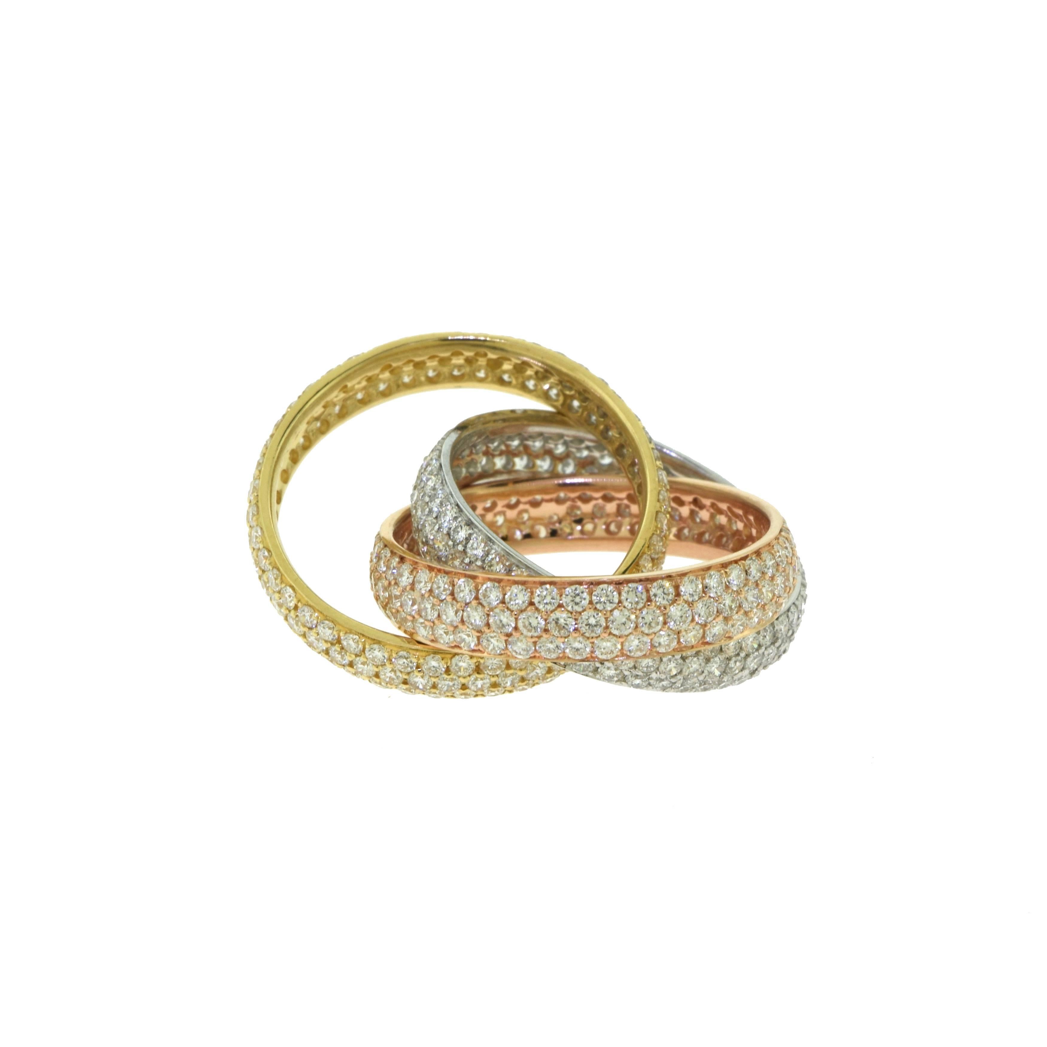 18 Karat Yellow, Rose, and White Gold Tri-Color Trinity Rolling Ring In Excellent Condition For Sale In Miami, FL