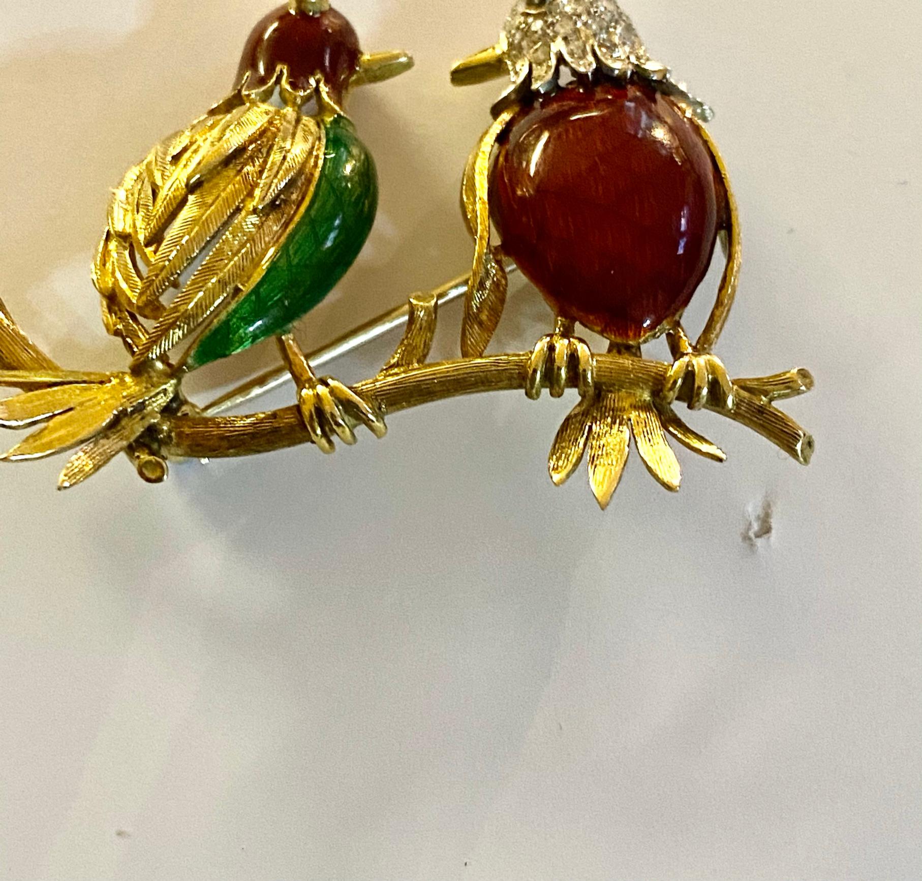 One (1) 18K. Yellow Gold Brooch , stamped KT18 decorated with Red and Green Enamel.
37 single Cut Diamonds = 0.45 ct.  VVS /SI  F-G
1 syntehtic Ruby 0.03 ct.
Made in USA ca 1960  and imported to England (UK) in that time. ()original stamped)
Weight:
