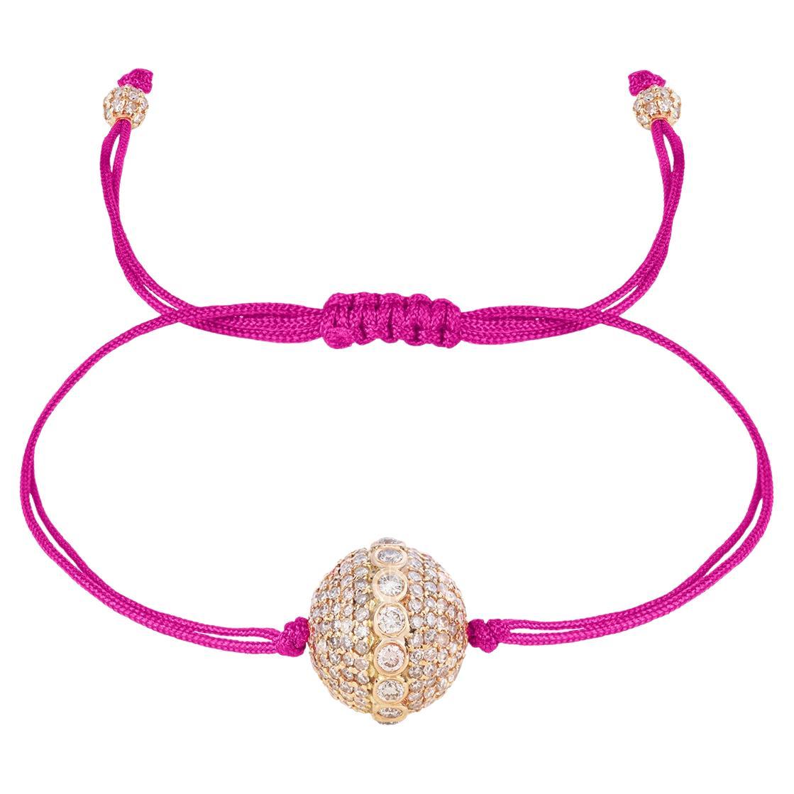 18k YG, big diamond encrusted orb, string bracelet For Sale