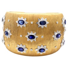 18K YG Cuff Bracelet with 1.2 Carat Round Diamonds and 14.25 Carat Sapphire