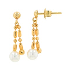 Ohrringe mit Mikimoto-Perlen aus 18 Karat Gelbgold