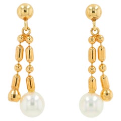 Ohrringe mit Mikimoto-Perlen aus 18 Karat Gelbgold