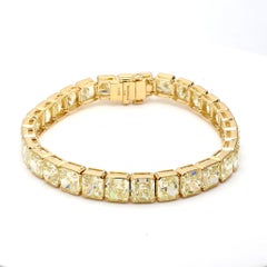 18K YG Tennis Bracelet with 43.35 Carat Radiant Cut Diamonds Fancy-lit GIA