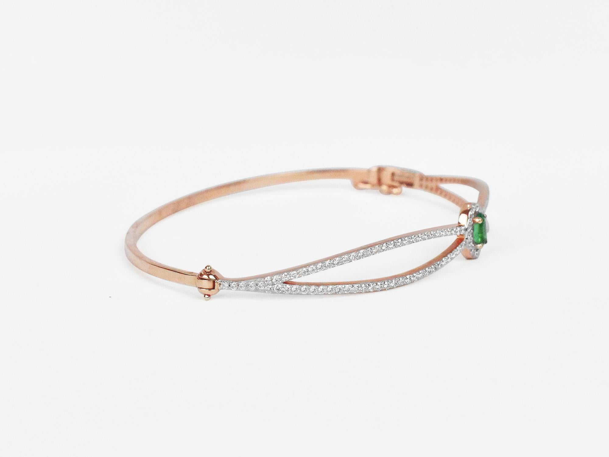 18Karat Gold Rose Gold Emerald Oval Diamond Pave Bangle Bracelet
            An 18K solid Rose Gold hinge bangle. An elegent piece of jewelry for enjoying life every day with a celebration of unbound freedom. A treasure crafted by Oshi Jewels