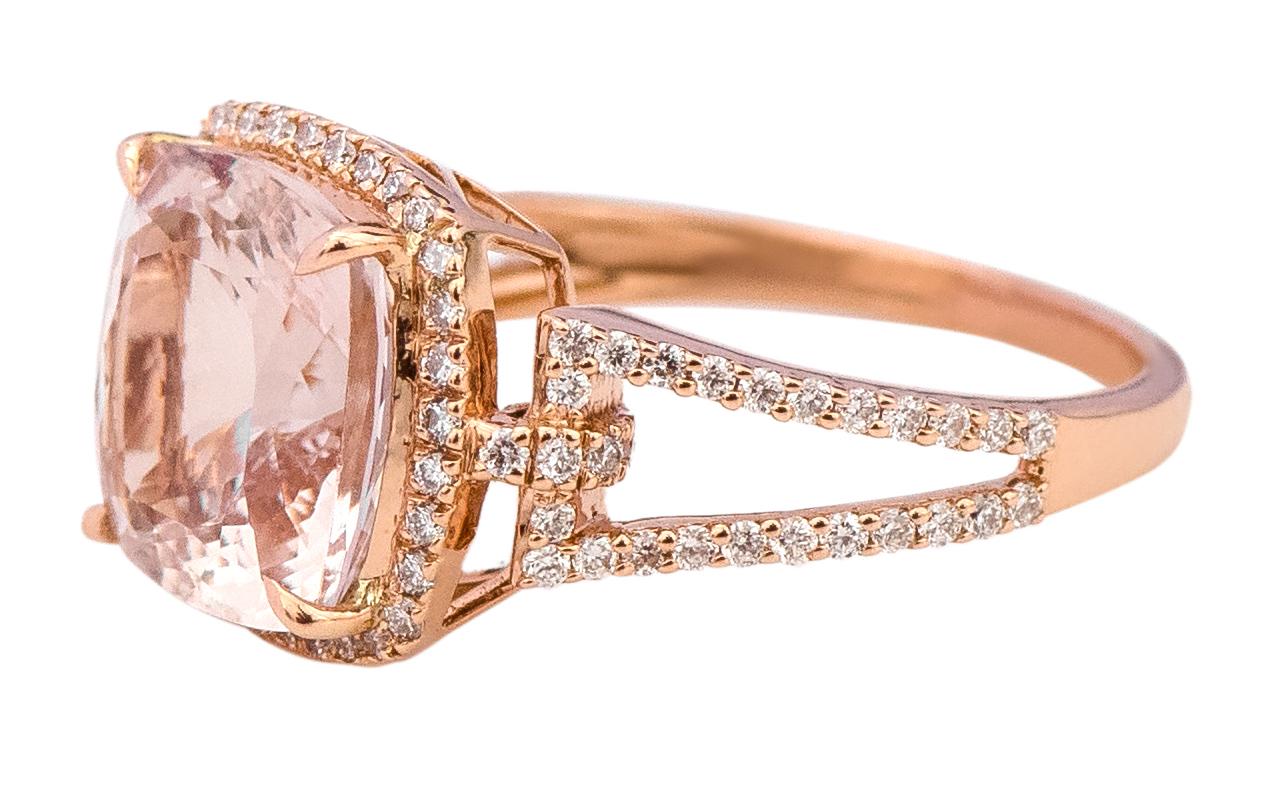 18 Karat Rose Gold 4.05 Carat Cushion-Cut Pink Morganite and Diamond Cluster Ring

This impressive peachy pink morganite and diamond ring is alluring. The solitaire cushion cut morganite in eagle prong-setting is accentuated with the single row of