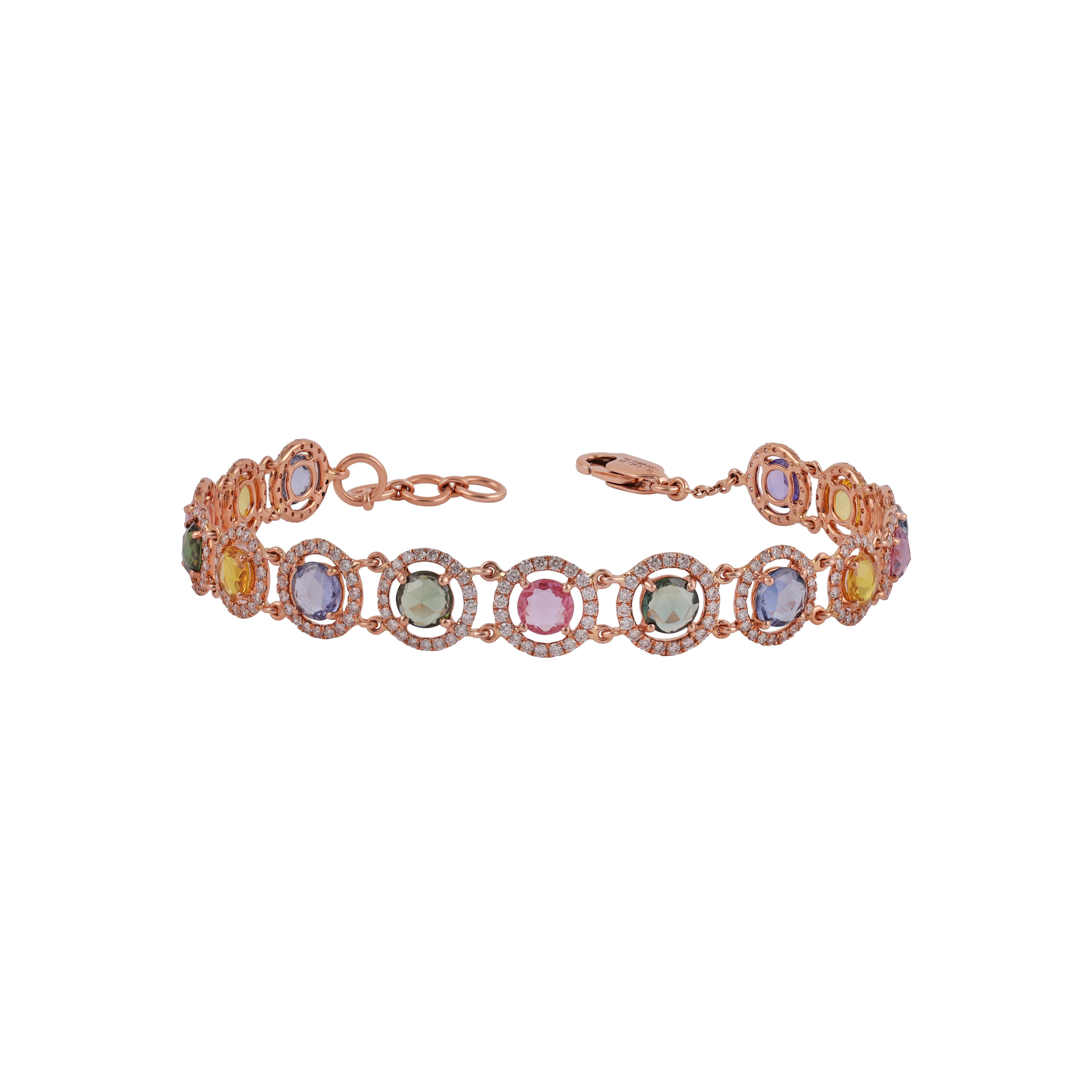 18 Karat Yellow Gold 7.25 Carat Multi-Sapphire and Diamond Cluster Tennis Bracelet

This magnificent fancy shape rainbow sapphire tennis bracelet is incredulous. The solitaire fancy-shaped rose-cut multi-sapphires are beautifully surrounded by a