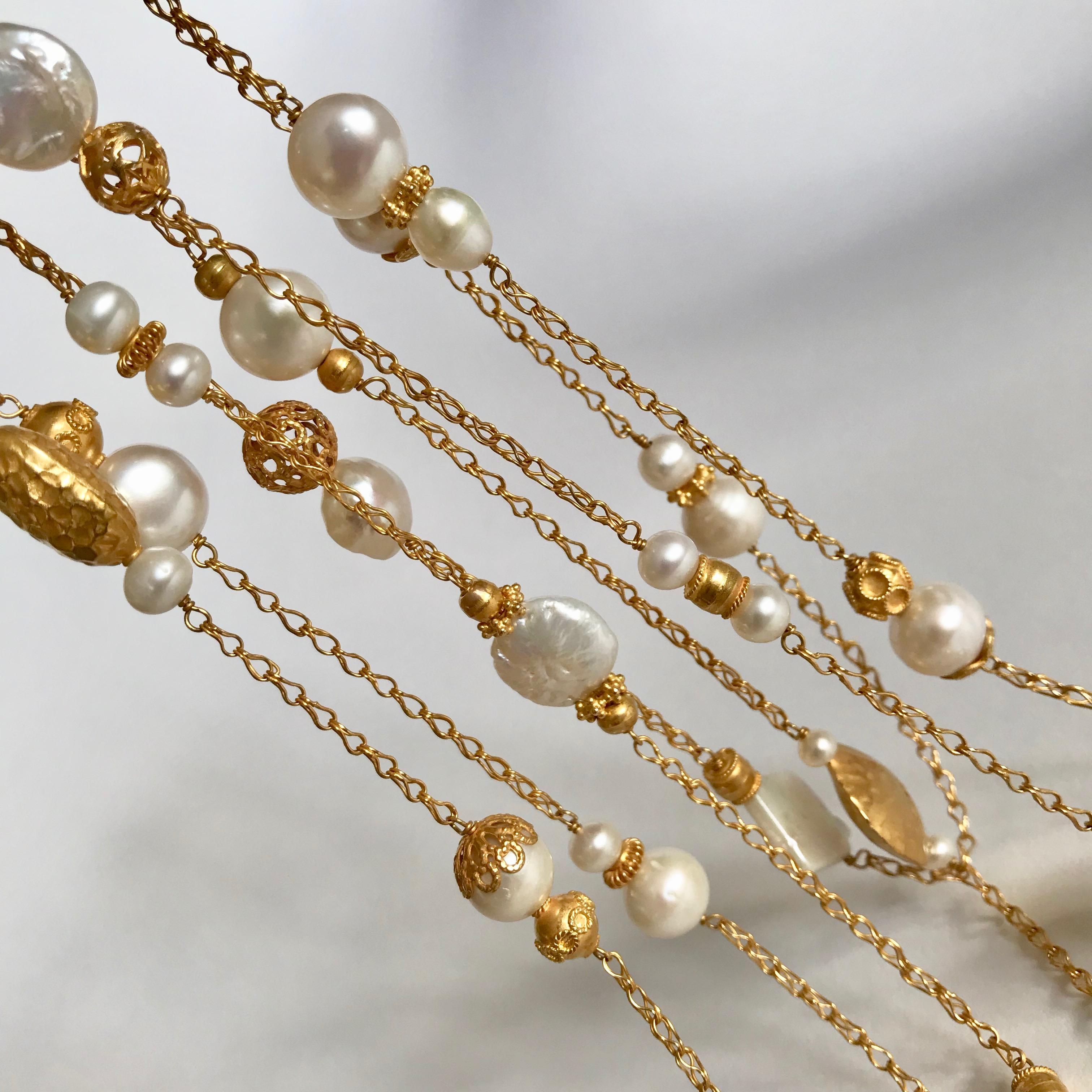 Skilfully handmade solid yellow gold and freshwater baroque cultured pearls in satin finish.
This necklace has a secure hand made clasp and it has been Hallmarked at London Goldsmiths’ Company – Assay Office. 
It is timeless, easy to wear and gives