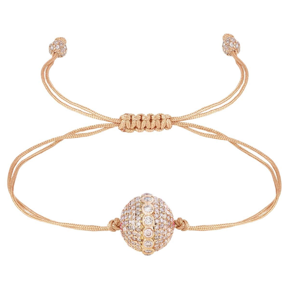 18karat YG, big diamond encrusted orb string bracelet For Sale