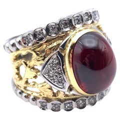 Granato cabochon 18KT e platino e reticolo di diamanti  Anello