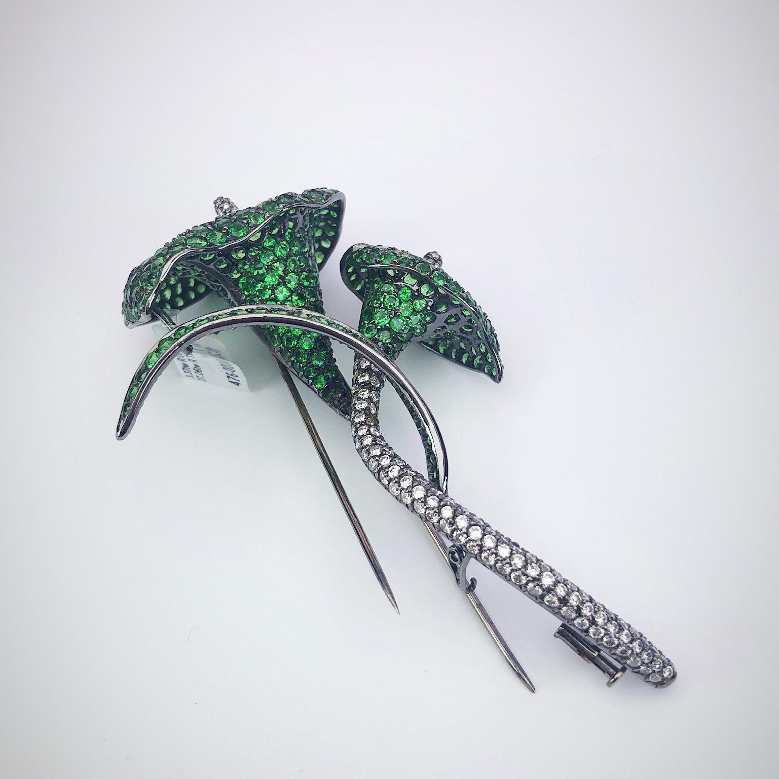 Modern 18 Karat Blackened Gold Calla Lily Brooch with Diamonds and Green Garnets For Sale