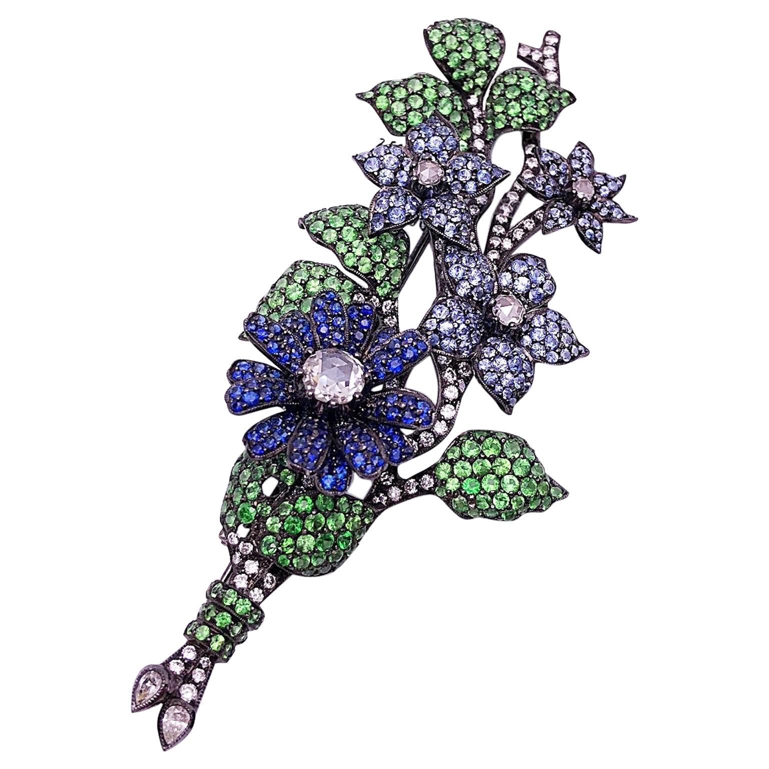 18Kt Blackened Gold Flower Brooch with Blue Sapphires, Tsavorites and Diamonds