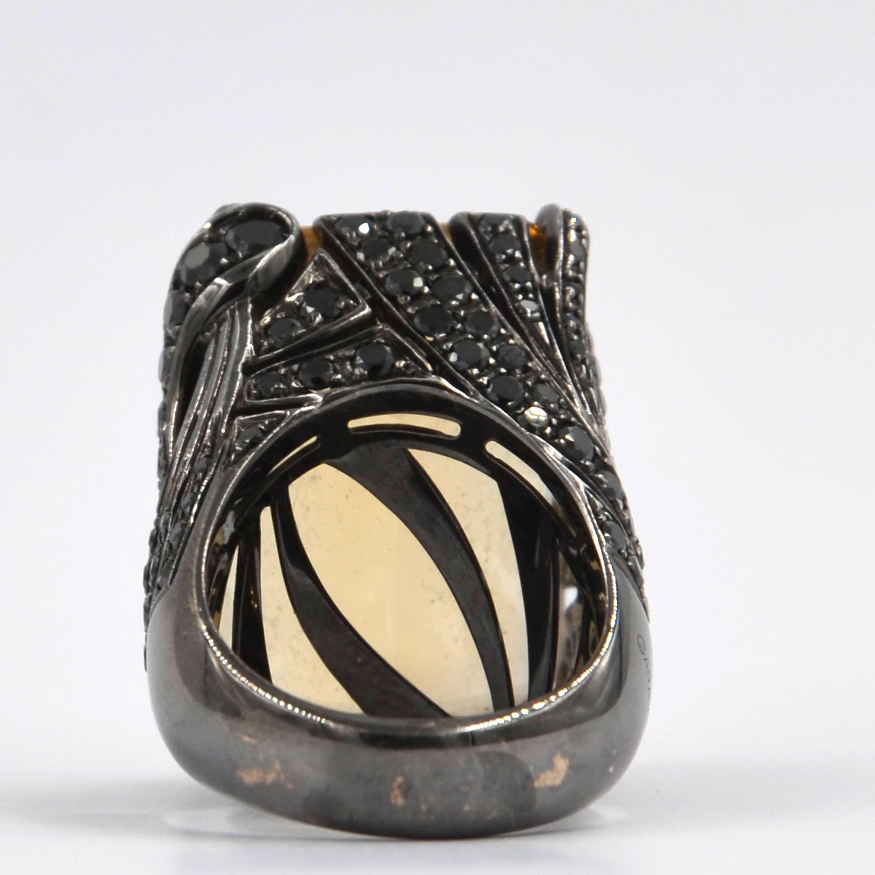 18 Karat Blackened White Gold One Of A Kind Yellow Citrine and Black Diamonds Garavelli Ring 
Hand made in Italy Finger size 56
18KT GOLD gr : 26.2
BLACKDIAMONDS ct : 3.44
YELLOW TOPAZ ct 46.25
 