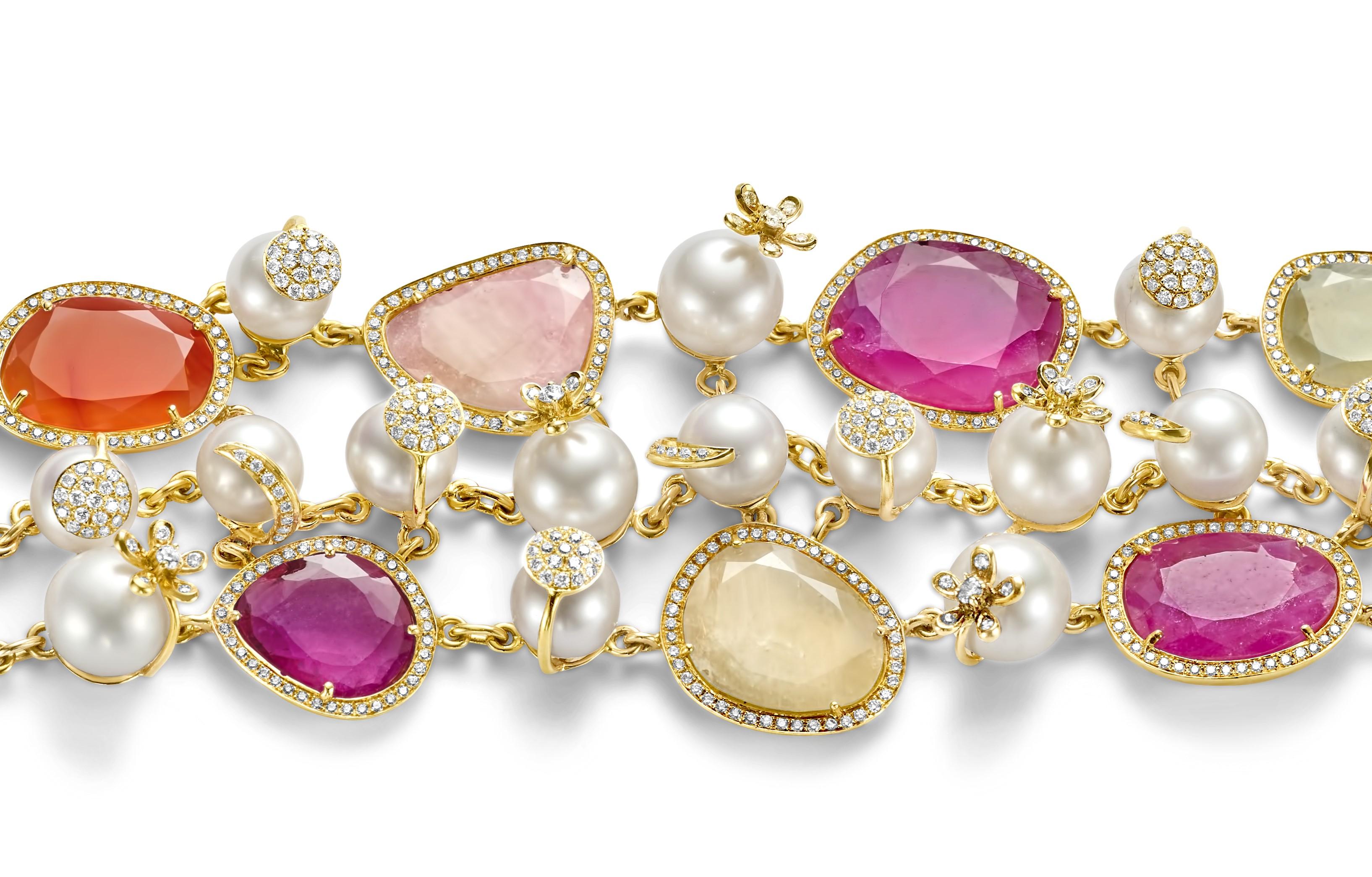 Magnificent Bracelet with 78.27 ct. Rubellite and Semi Precious Stones, Pearls & Diamonds

Diamonds: Brilliant cut diamonds in total 2.17 ct. 

Rubellite and semi precious stones in total 78.27 ct.

Pearls: 20 natural pearls

Material: 18kt Yellow
