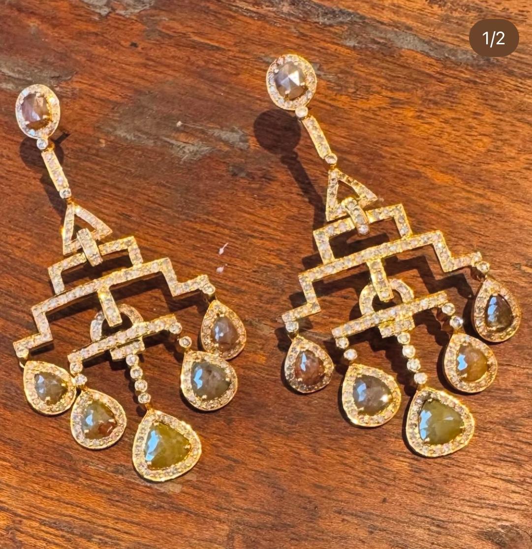 Orecchini con diamanti 18kt
10.2.  taglio a rosa con pavé 
1.5 g