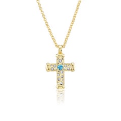 18kt. Cross on a chain with color heart shaped stone & approx. 0.10ct diamonds