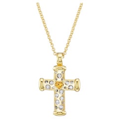 18kt. Cross on a chain with color heart shaped stone & approx. 0.32ct diamonds