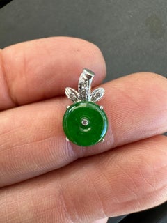 18kt Deep Green Jadeite Disc and Diamond Bow-tie Pendant Drop