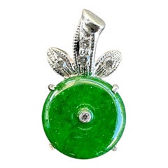 18kt Deep Green Jadeite Disc and Diamond Bow-tie Pendant Drop