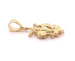 Pendentif Fleur D' Lis à double face en or 18 carats