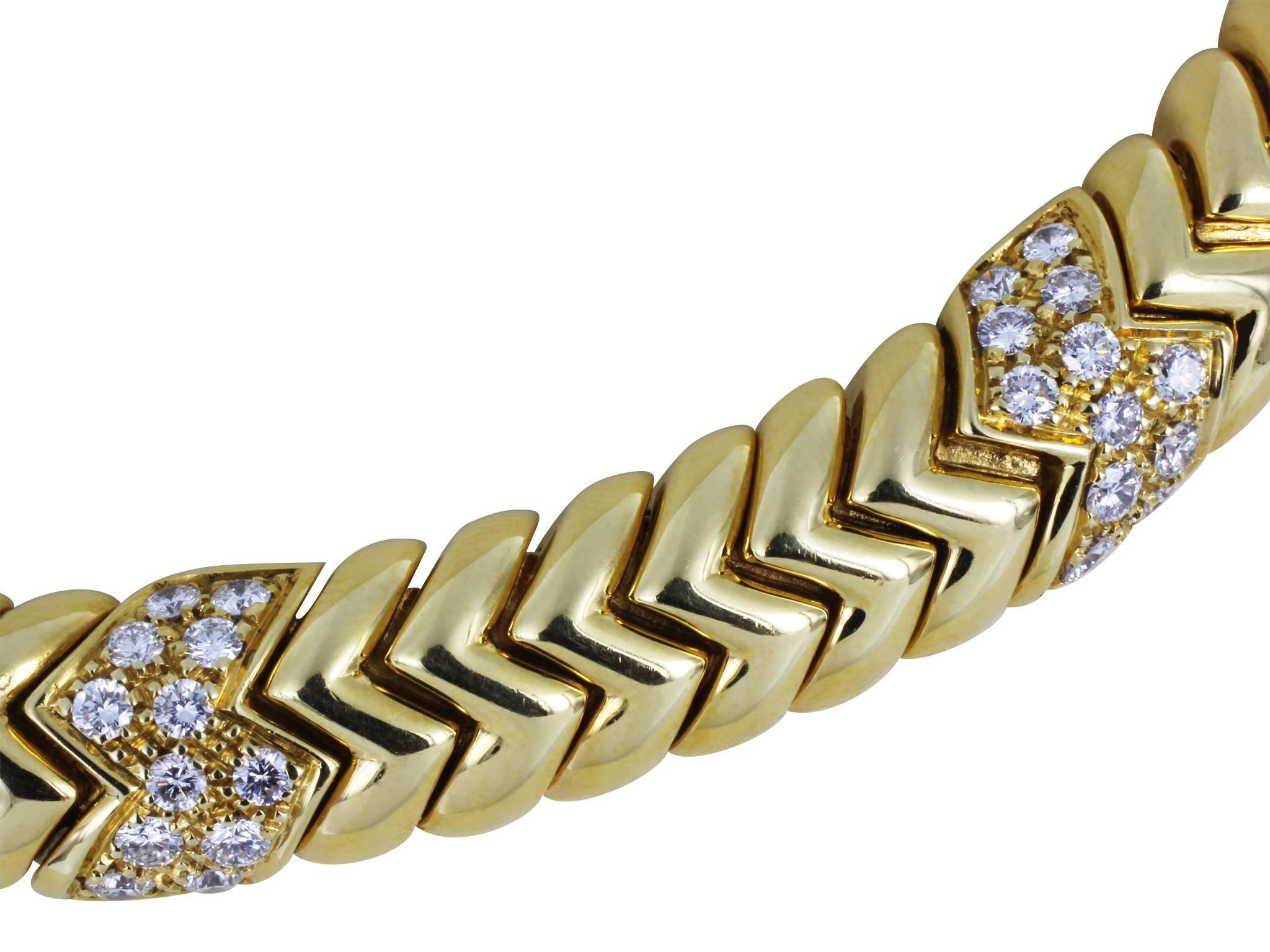 Estate Bulgari 18 karat yellow gold Spiga collar style necklace, consisting of 60 bead set round brilliant cut diamonds having a total approximate weight of 3.90 carats.