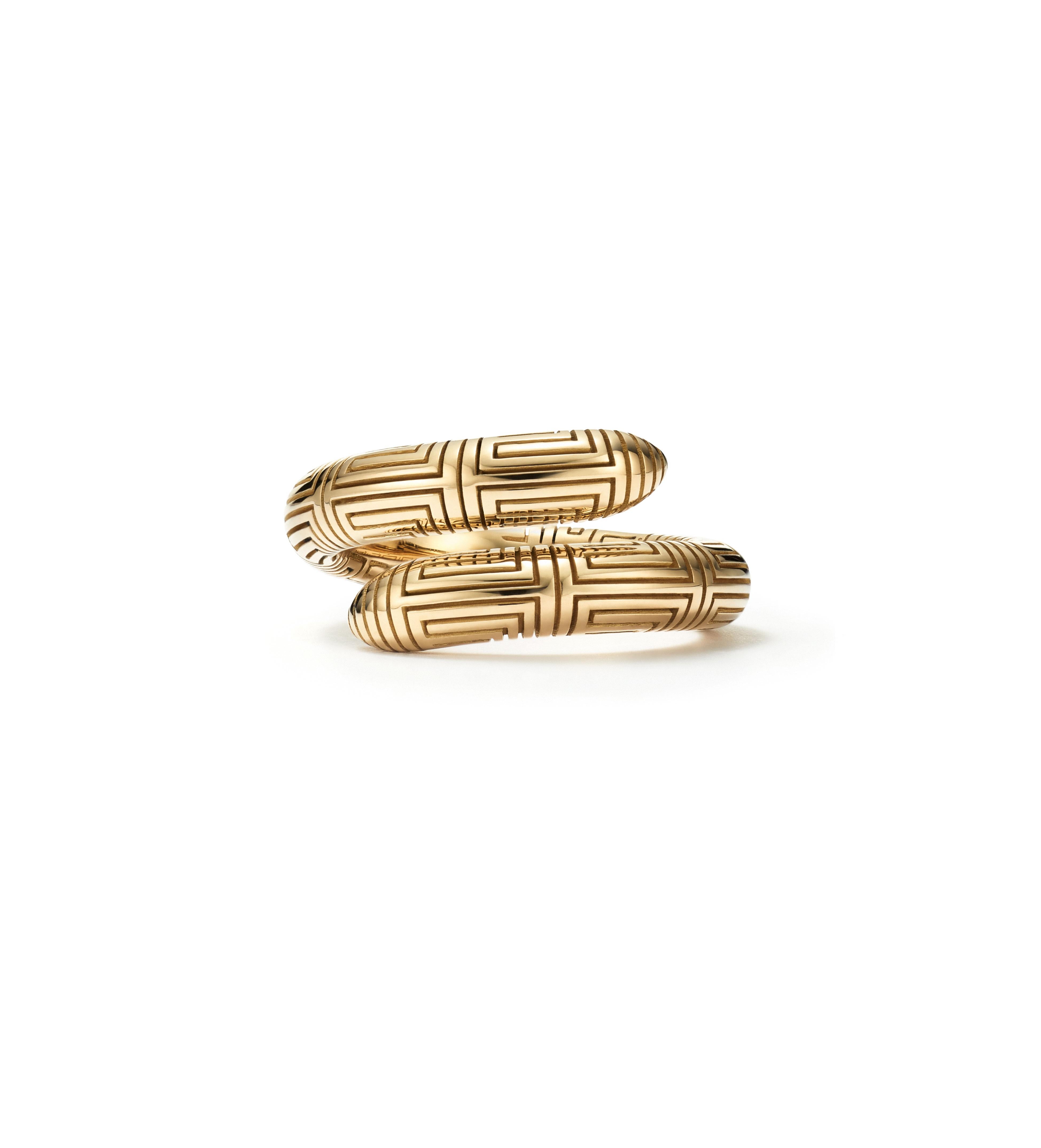 The women and men of Ancient Greece wore this gold spiral ring that is delicately engraved by hand with the Grecian key pattern to represent the symbol of infinity. Wear it today effortlessly with jeans and a t-shirt. 

Handcrafted with 18kt