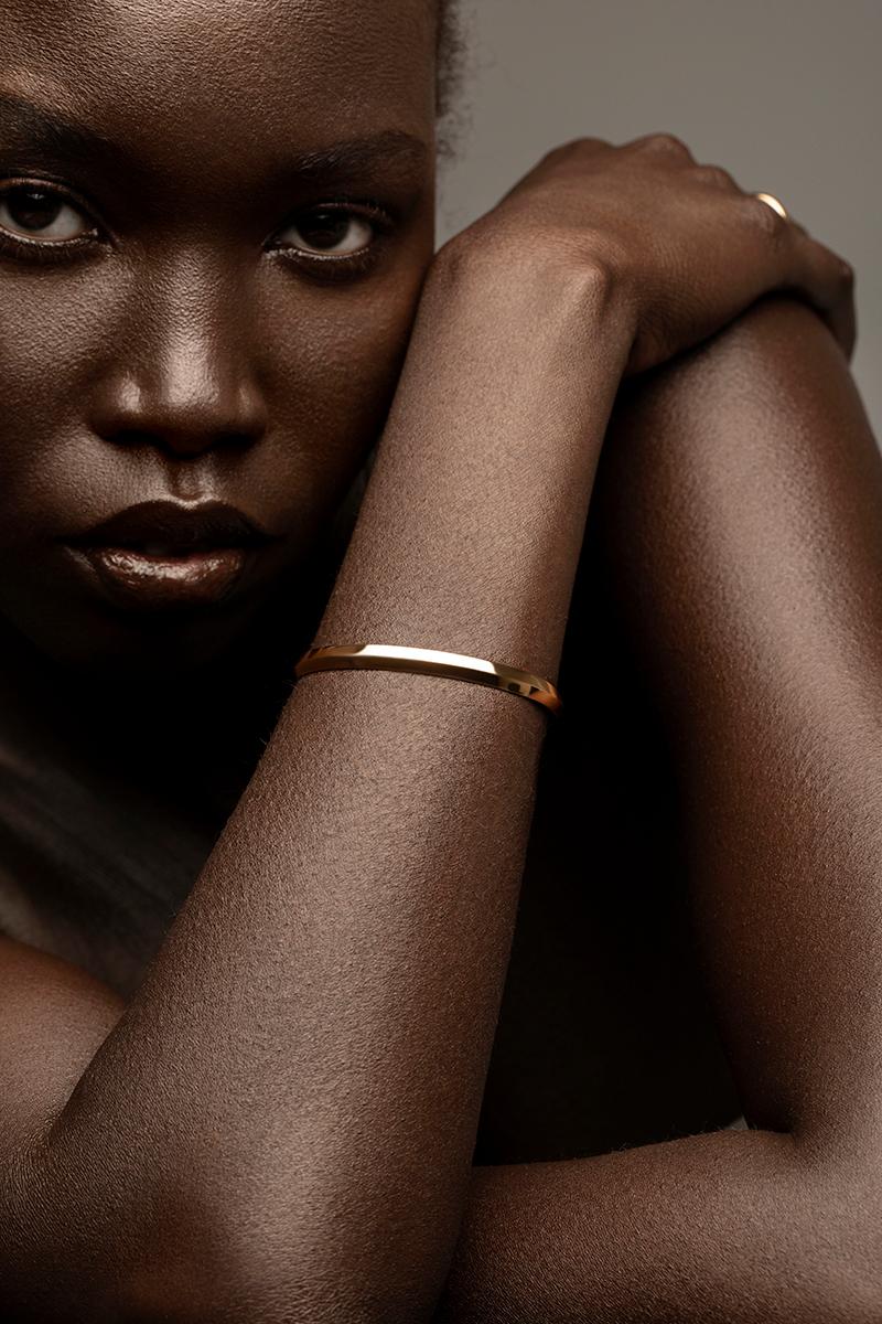 The Amore cuff features a subtle ridge detail for added elegance, just the cuff you need for your jewelry box.

Handcrafted in NYC with 18kt certified Fairmined Ecological gold that is toxic chemical free, sustainable, ethical and clean.

Please