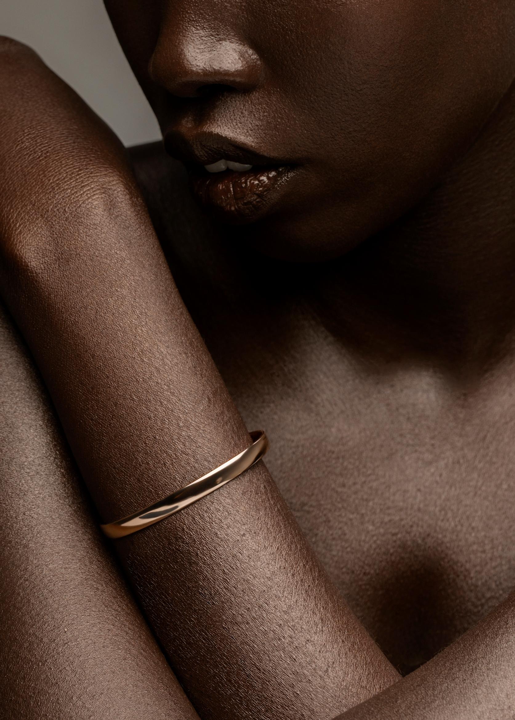 The Sincerity cuff is the perfect bracelet with streamlined design for all occasions.

Handcrafted in NYC with 18kt certified Fairmined Ecological gold that is toxic chemical free, sustainable, ethical and clean.

Please allow 3-4 weeks from your