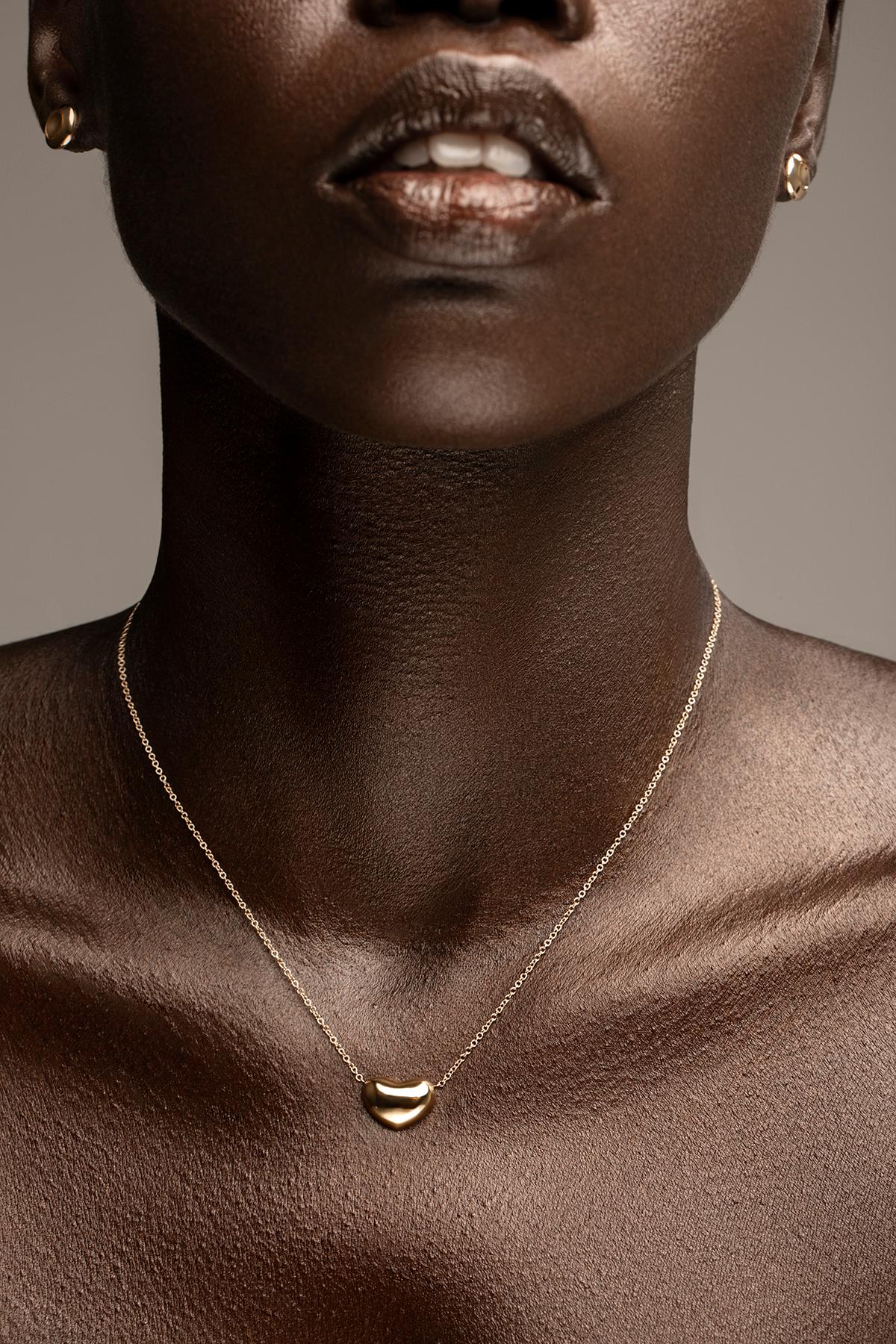 Our Heart necklace meant to be worn and cherished forever.

Handcrafted in NYC with 18kt certified Fairmined Ecological gold that is toxic chemical free, sustainable, ethical and clean. Chain is 16
