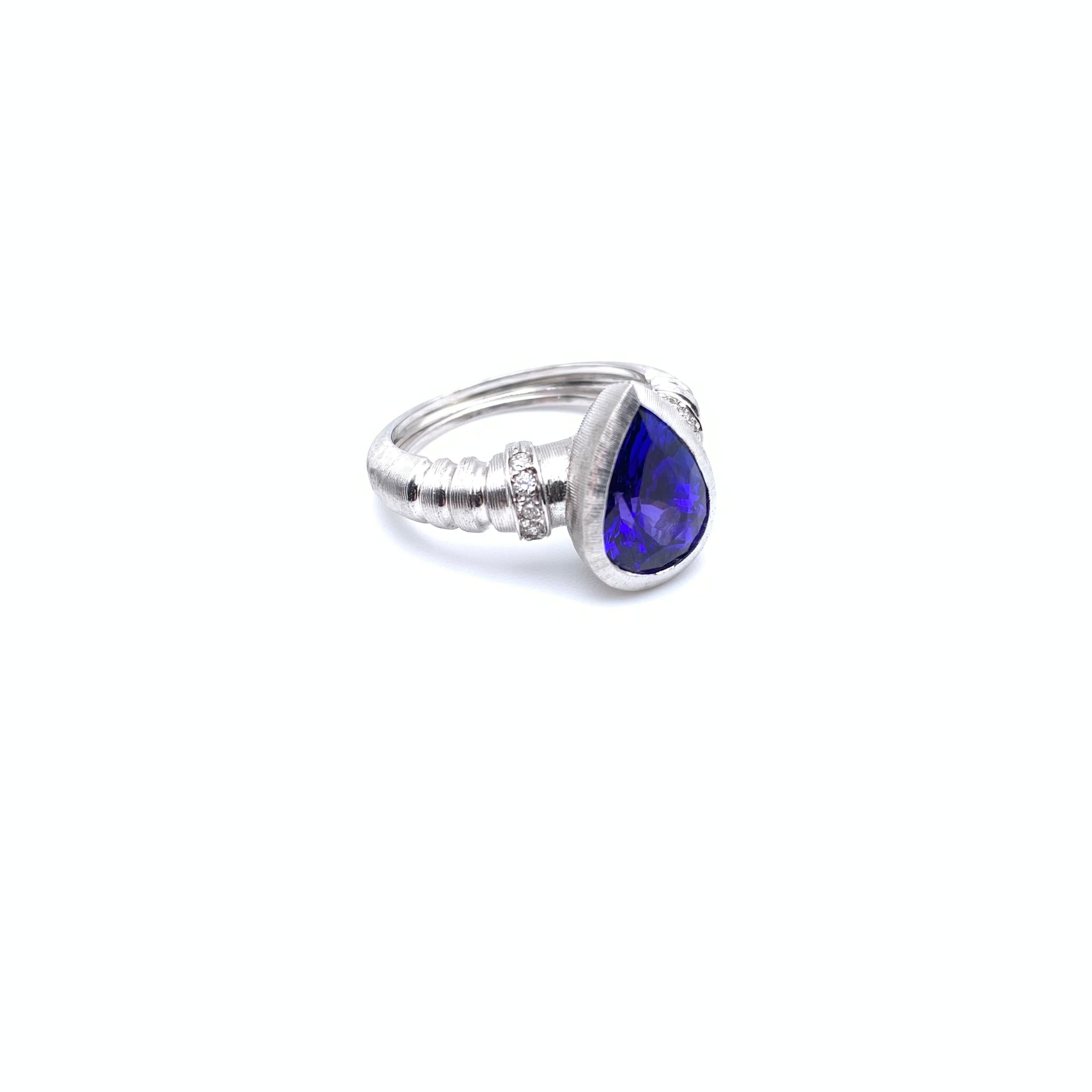 Regency 18KT Florentine Engraved 4.03 CT Tanzanite & Diamond Ring For Sale