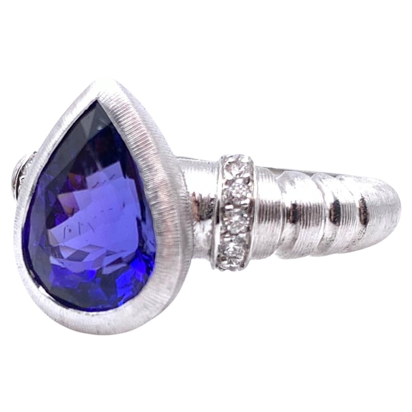 18KT Florentine Engraved 4.03 CT Tanzanite & Diamond Ring