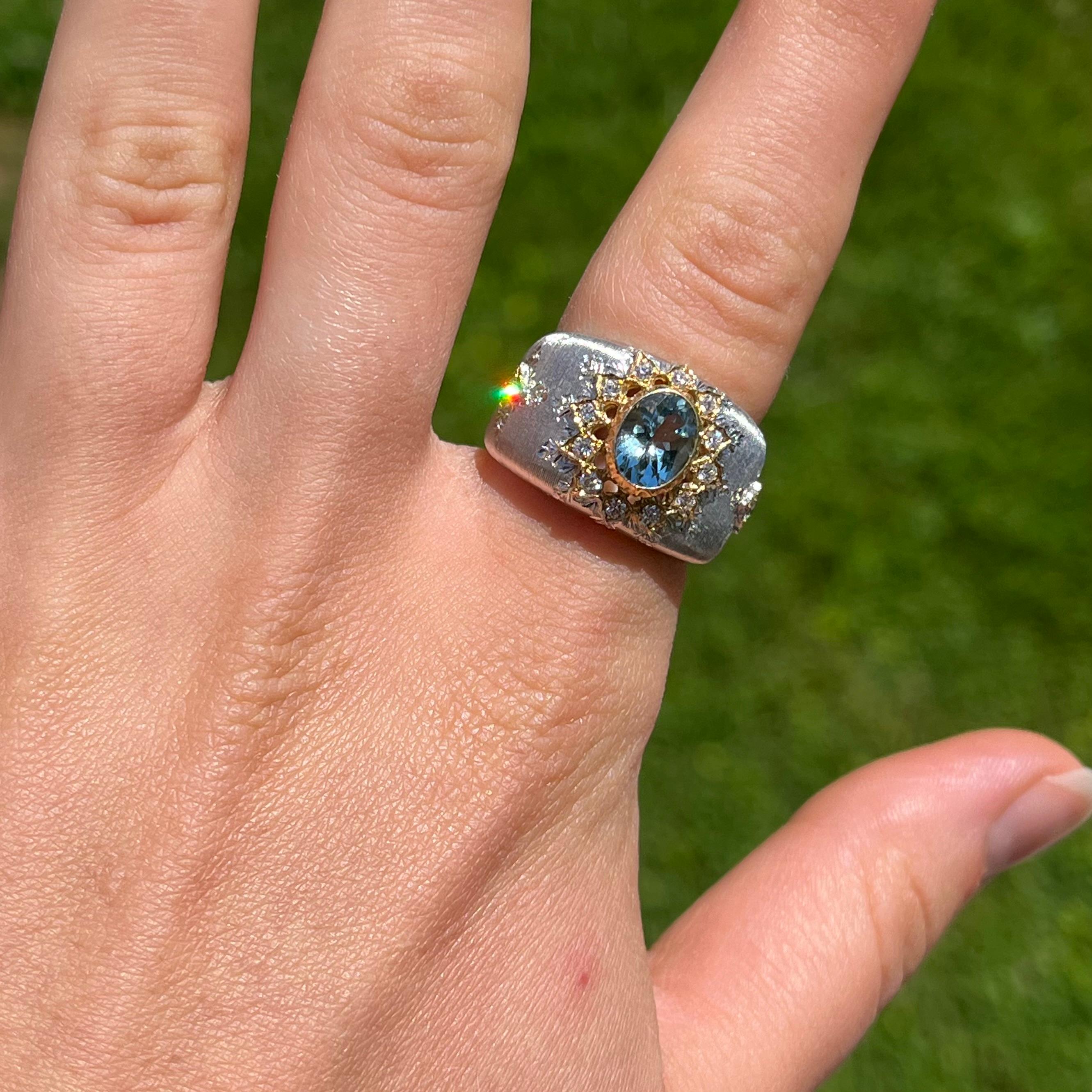 Rich and regal, this beautiful ring was handcrafted by a family jeweler outside of Florence, Italy. It is made of solid, 18-karat yellow and white gold with each silk line being etched in by hand. The edges of the ring bevel inwards for a