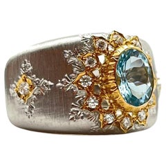 Anillo de Aguamarina y Diamante Grabado Florentino 18KT