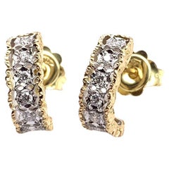 Abrazaderas enrejadas con diamantes grabados Florentina de 18 quilates