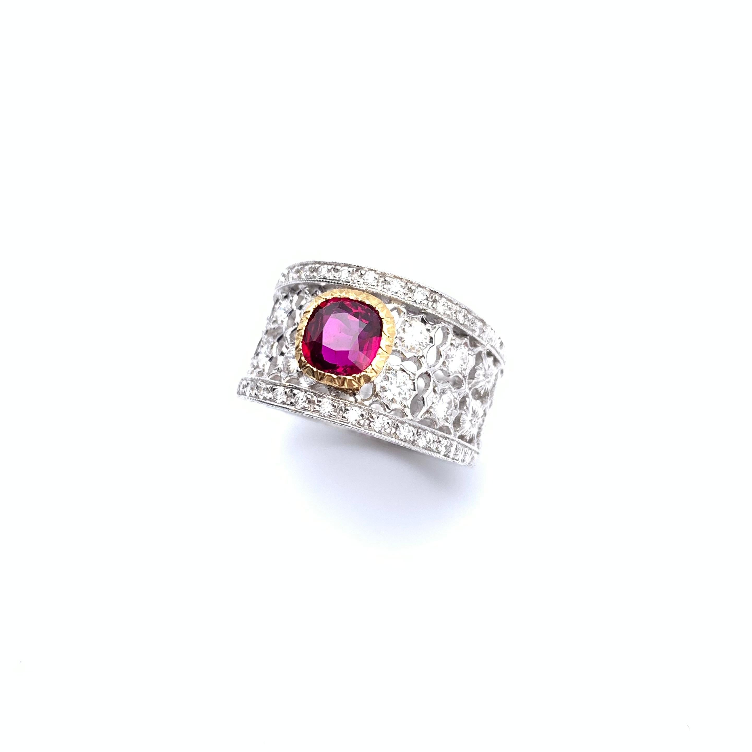 This beautiful ruby ring was handmade by a multigenerational goldsmith outside Florence, Italy. The technique is known as Florentine engraving and has been practiced in Italy for over 600 years. This unique handiwork is synonymous with the