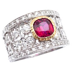 Bague Florentine 18KT gravée de rubis et de diamants