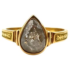 Anello con diamante sale e pepe con castone 18KT