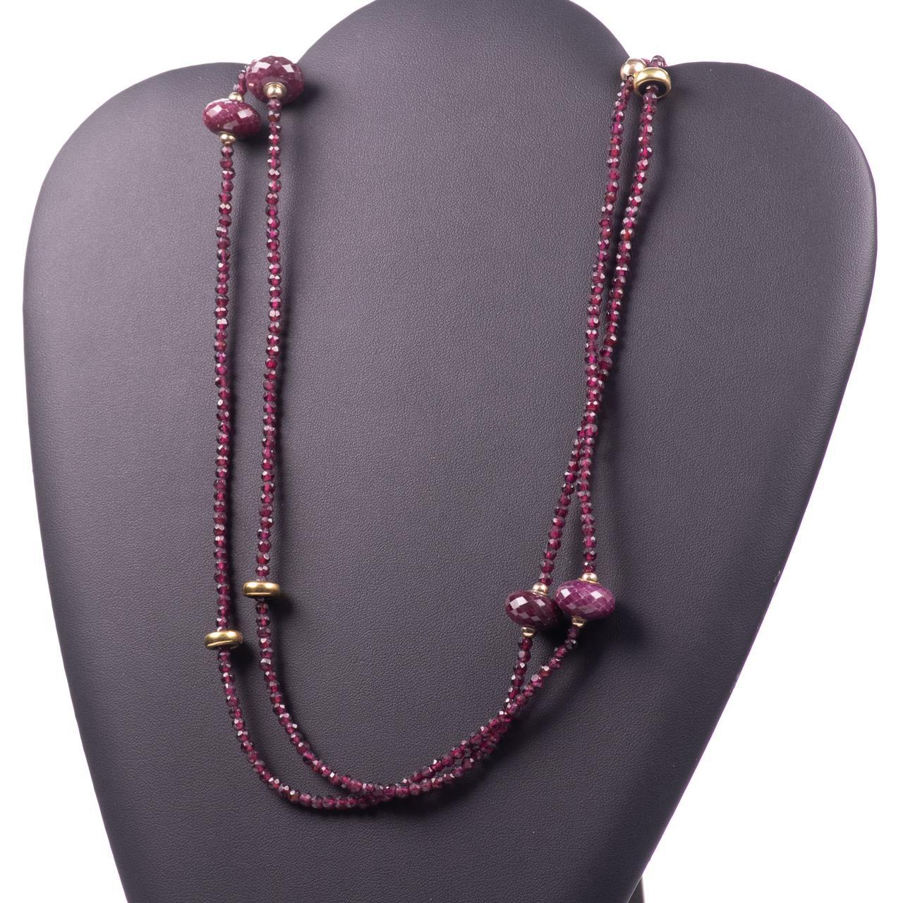 18KT Gold 300ct Rubies Art Deco Briolette-Cut Necklace

Necklace with rubies and yellow gold beads in between.Set with 500 briolette-cut rubies, measuring 3x3mm. Set with 6x larger briolette-cut rubies, measuring 15x9mm. Total ruby weight approx