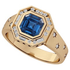 Amina Sorel, topaze bleue africaine en or 18 carats  Bague à anneaux avec diamants et code morse 