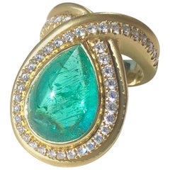 18kt Gold Band with a 10.55ct Paraiba Tourmaline and 1.04ct G SI  Diamonds