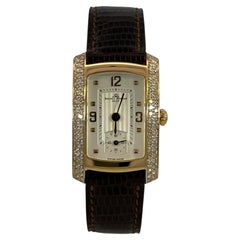 18 Karat Gold Baume & Mercier Hampton Milleis Armbanduhr mit Diamanten