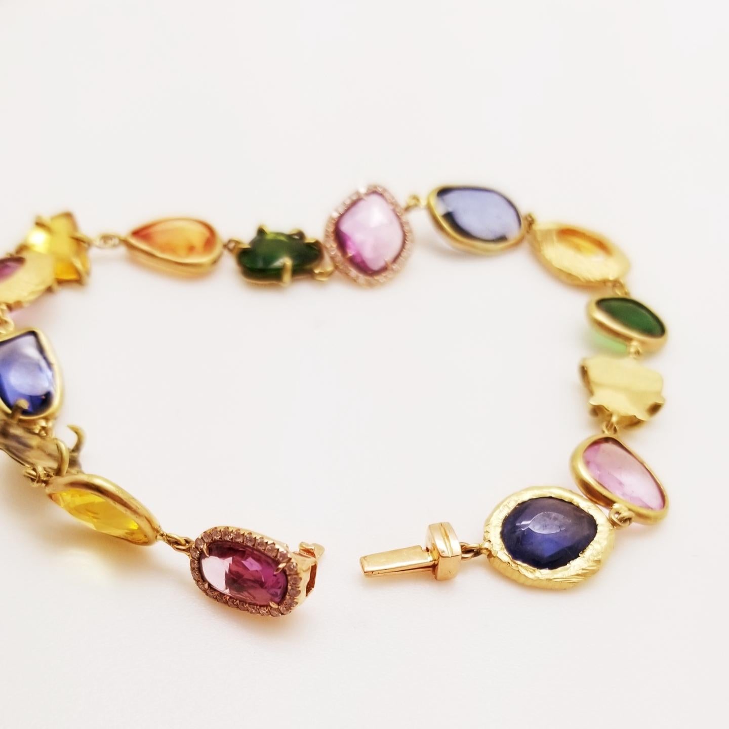 18KT Gold Bracelet with diamonds, tsavorites and blue, pink and yellow sapphires 1