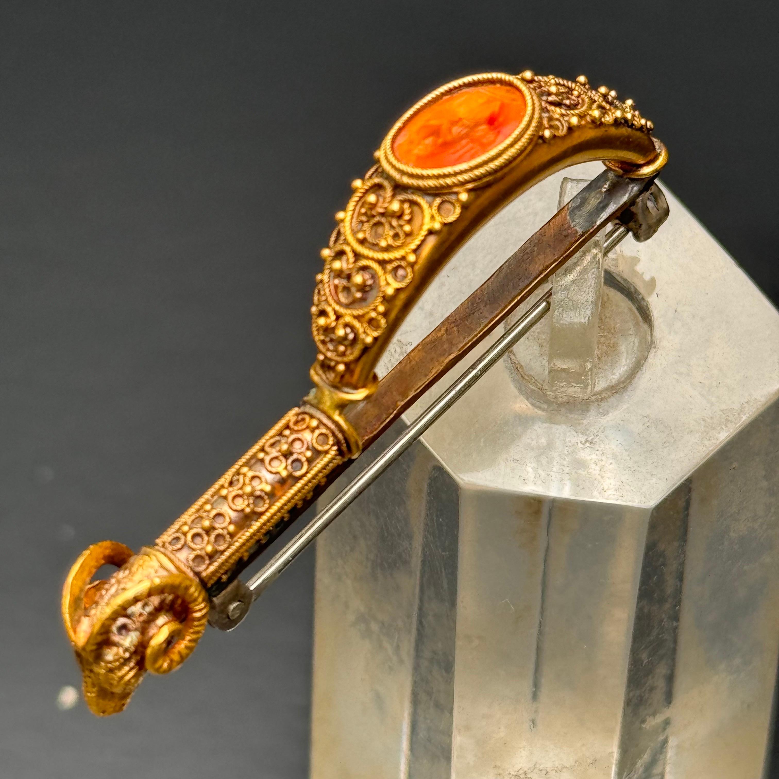 Oval Cut 18kt gold Carnelian Cameo Archaeological Revival Fibula Brooch For Sale