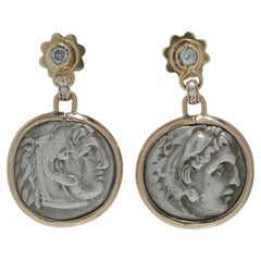 Pendientes de oro de 18 quilates con moneda romana de plata de Alejandro Magno