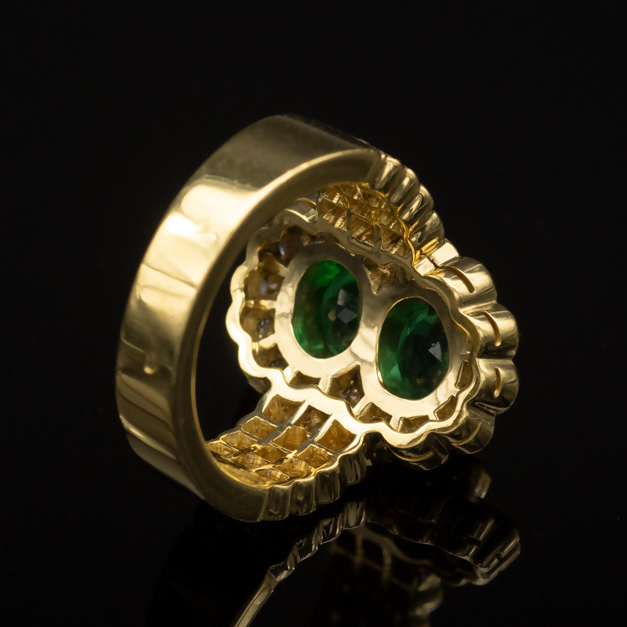 Women's 2 Oval Emeralds and Diamond 18-Karat Gold Halo Ring For Sale