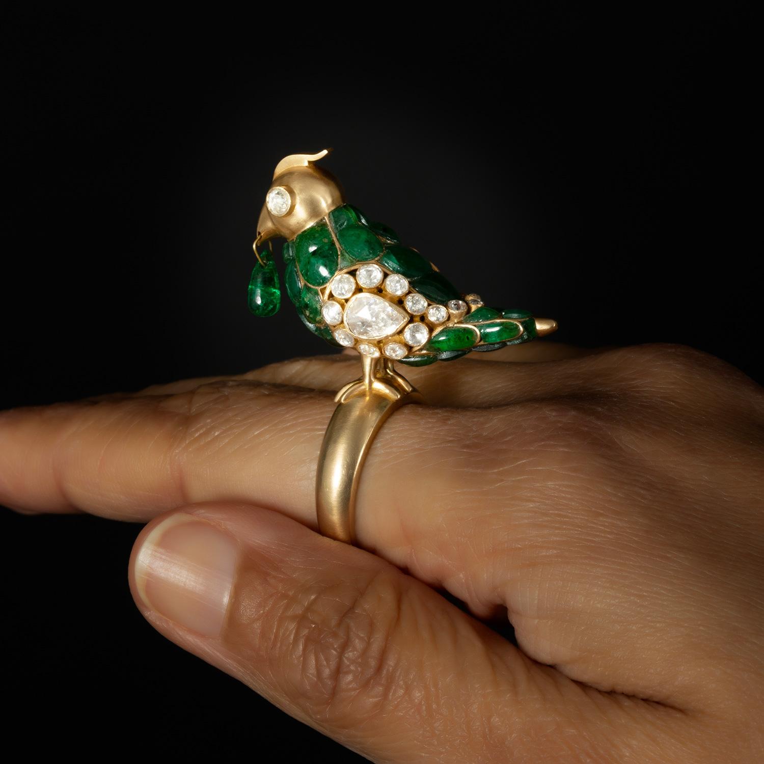 Inspired by the 18th Century Mughal Parrot (now part of the Al Thani collection available to view at the museum space of ‘hotel de la marine’ in Paris). This is our take.

The ring is set on 18kt gold, with emeralds & rose cut diamonds.

17mm