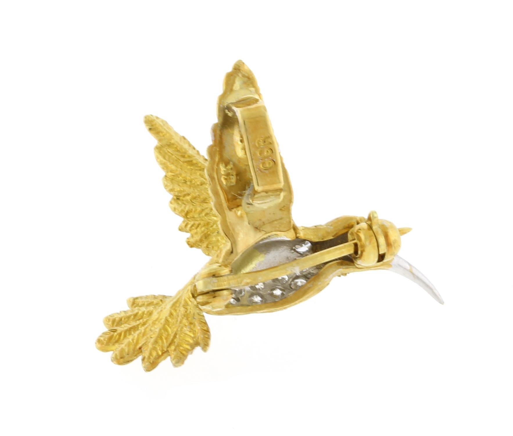 This cute brooch is yellow and white gold and can be wore for any occasion. 
♦ Metal: 18 karat
♦ Gemstones: Ruby and Diamonds
♦ Diamonds: 9=.09carats
♦ Weight: 3.7 grams
♦ Dimensions: 7/8in by 7/8in
♦ Packaging: Pampillonia Presentation Box
♦