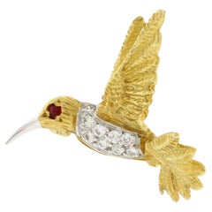 Broche colibri en or 18Kt