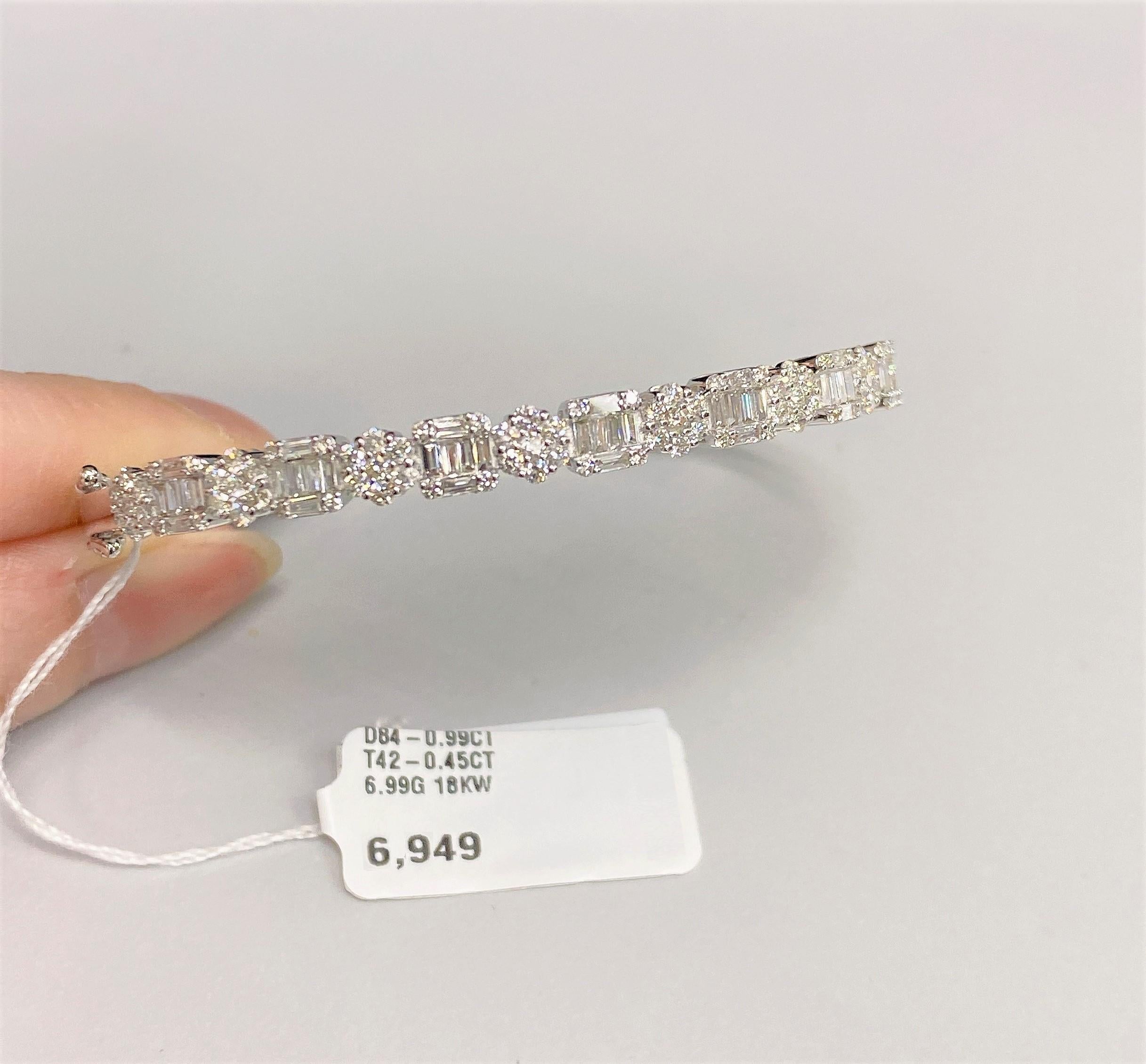 18KT Gold Important Fancy Baguette Floral Motif Diamond Bangle Bracelet In New Condition For Sale In New York, NY