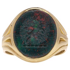 Antique  18kt. gold intaglio bloodstone signet ring, featuring a rampant unicorn